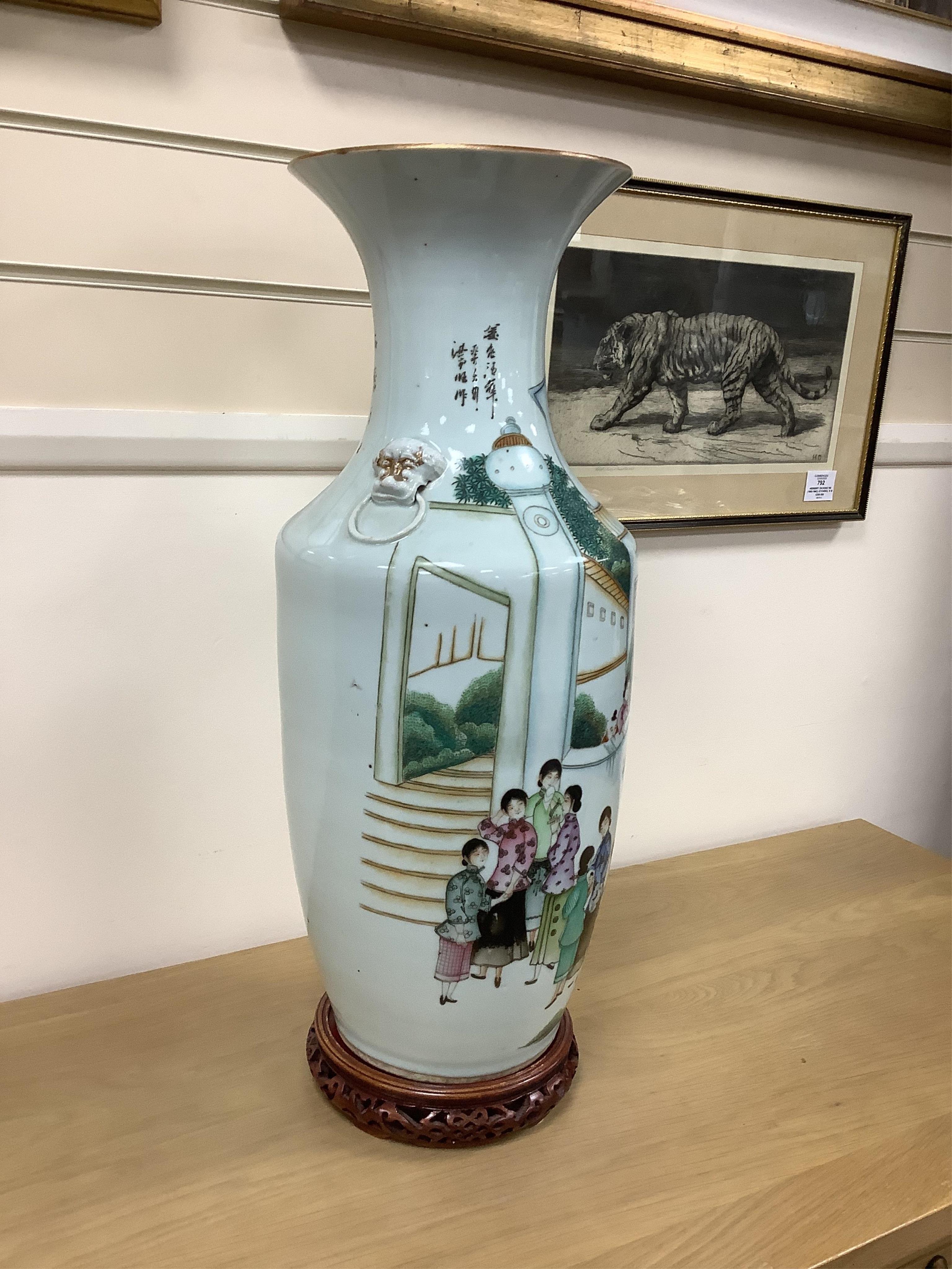 An early 20th century Chinese famille rose vase on stand. 57cm high. Condition - good